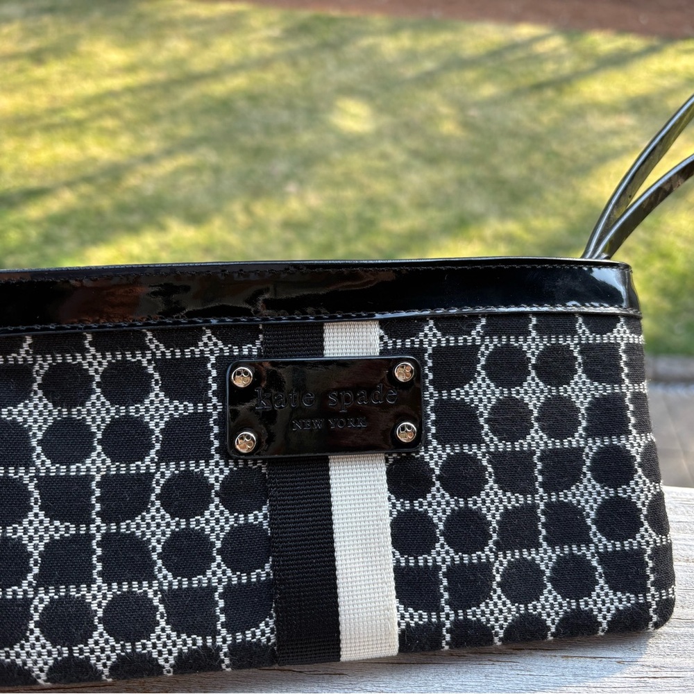 Kate Spade Black and White Patterned Wristlet Clutch with patent leather trim